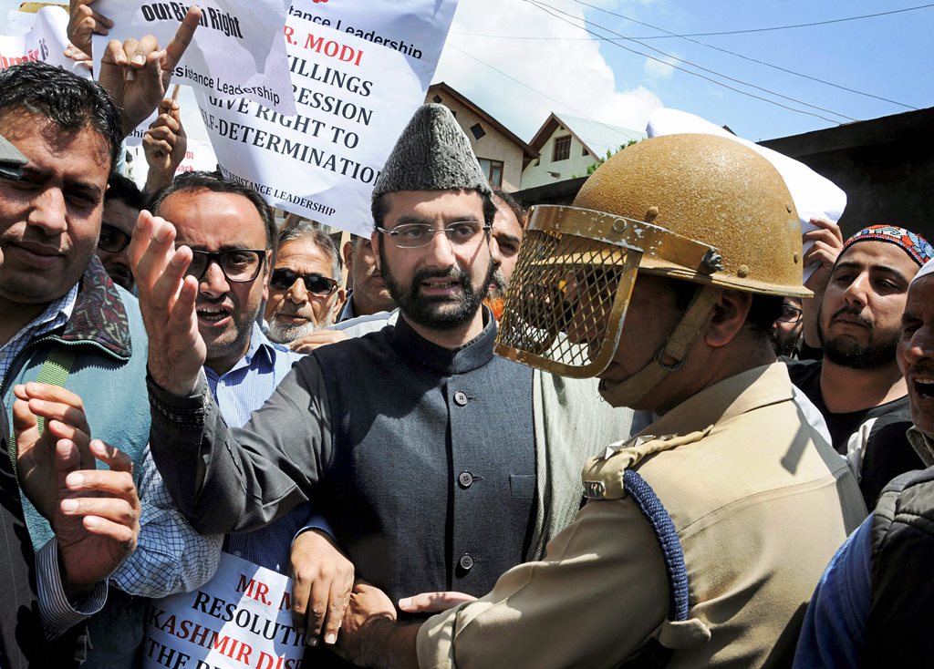 Srinagar: Mirwaiz Umar Farooq, Chairman, Hurriyat Conference defies his house detention and leads a rally to protest against the visit of Prime Minister Narendra Modi, in Srinagar, on Saturday. (PTI Photo) (PTI5_19_2018_000060B)
