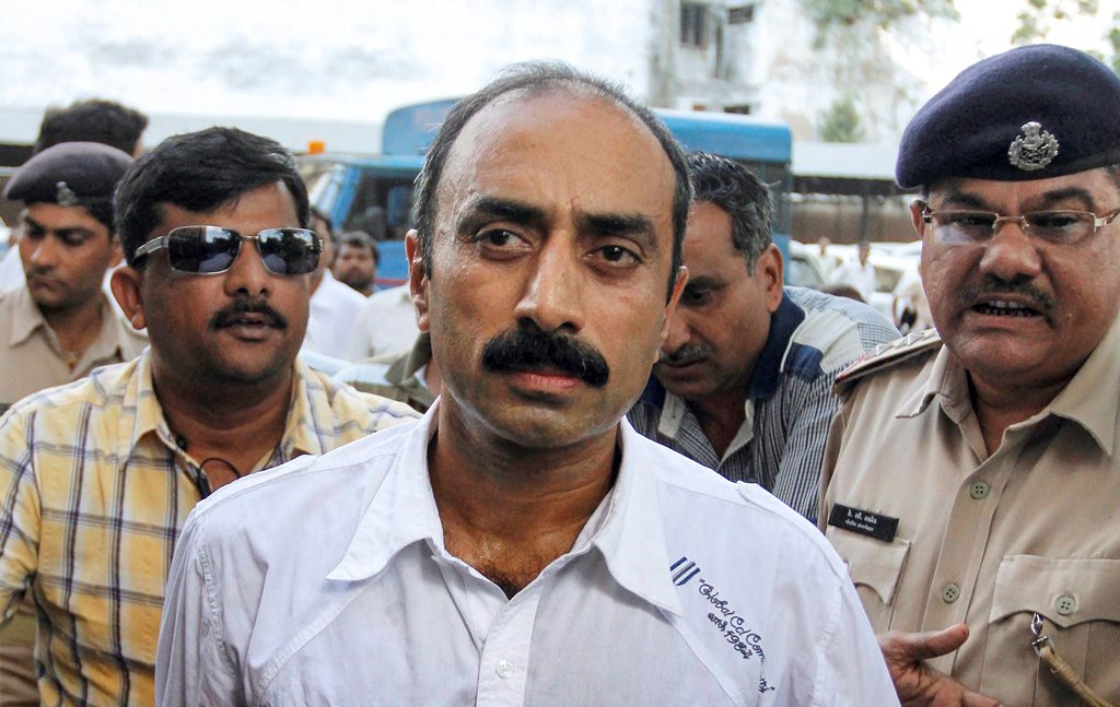 **FILE** New Delhi: In this file photo dated October 01, 2011, shows suspended IPS officer Sanjiv Bhatt being produced in the court, in Ahmadabad. According to the officials, Bhatt was arrested on Wednesday, Sept 05, 2018, by the Gujarat CID in connection with a 22-year-old case of alleged planting of drugs to arrest a man. (PTI Photo) (PTI9_5_2018_000267B)