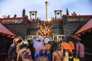 Sabarimala: Devotees enter the Sabarimala temple as it opens amid tight security, in Sabarimala, Friday, Nov. 16, 2018. (PTI Photo) (Story no. MDS18) (PTI11_16_2018_000138B)