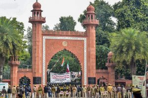 Aligarh: Police personnel deployed on the campus of Aligarh Muslim University in the view of protests after some students were booked on alleged sedition charges, in Aligarh, Friday, Feb 15, 2019. (PTI Photo) (PTI2_15_2019_000168B)