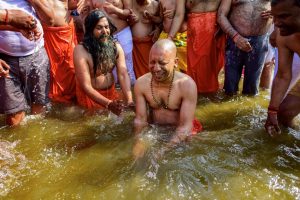 Allahabad: Uttar Pradesh Chief Minister Yogi Adityanath takes a holy dip in the water of River Ganga at Sangam during the ongoing Kumbh Mela-2019, in Allahabad, Tuesday, Jan. 29, 2019. (PTI Photo)(PTI1_29_2019_000066B)