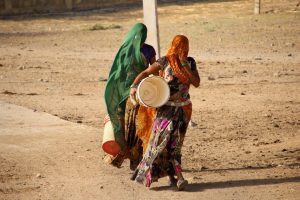 Beawar: Women carry vessels to collect drinking water on a hot summer day in Beawar, Rajasthan, Thursday, June 6, 2019. (PTI Photo)(PTI6_6_2019_000083B)