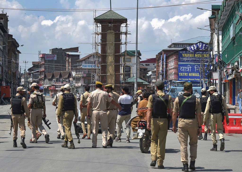 Srinagar: Policemen patrolling at Lal Chowk after restrictions were lifted, in Srinagar, Tuesday, Aug. 20, 2019. Barricades around the Clock Tower in Srinagar's city centre Lal Chowk were removed after 15 days, allowing the movement of people and traffic in the commercial hub, as restrictions eased in several localities while continuing in others. (PTI Photo/S. Irfan)(PTI8_20_2019_000114B)