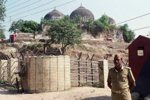 Ayodhya: FILE - In this Oct. 29, 1990, file photo, Indian security officer guards the Babri Mosque in Ayodhya, closing off the disputed site claimed by Muslims and Hindus. India‚Äôs top court is expected to pronounce its verdict on Saturday, Nov. 9, 2019, in the decades-old land title dispute between Muslims and Hindus over plans to build a Hindu temple on a site in northern India. In 1992, Hindu hard-liners demolished a 16th century mosque in Ayodhya, sparking deadly religious riots in which about 2,000 people, most of them Muslims, were killed across India. AP/PTI(AP11_9_2019_000012B)