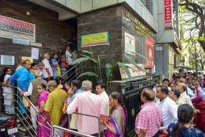 Bengaluru: Depositors stand in queue to withdraw money from Sri Guru Raghavendra Sahakara Bank in Bengaluru, Tuesday, Jan.14, 2020. The Reserve Bank of India (RBI) has curbed Sri Guru Raghavendra Sahakara bank from doing business with immediate effect for alleged irregularities in transactions. (PTI Photo/Shailendra Bhojak)(PTI1_14_2020_000047B)