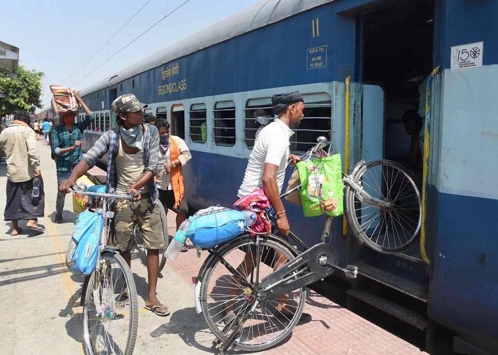 Patna: Migrants load their bicycles in a train to reach their native place, during a nationwide lockdown in the wake of coronavirus pandemic, in Patna, Saturday, May 16, 2020. (PTI Photo)(PTI16-05-2020_000089B)