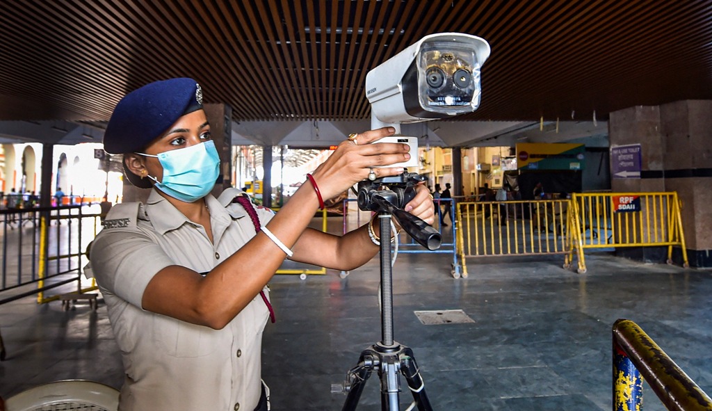 Kolkata: A security personnel installs CCTV cameras to keep a watch on passengers at the Sealdah Railway Station as local train service prepares to resume from November 11 after closure for months due to COVID-19 pandemic, in Kolkata, Monday, Nov. 9, 2020. (PTI Photo/Ashok Bhaumik) (PTI09-11-2020 000103B)