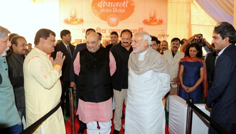 honble_prime_minister_shri_narendra_modi__bjp_president_shri_amit_shah_interacting_with_media_personnel_at_diwali_milan_program_at_11_ashok_road_on_november_28_2015_2_20151128_1935175959