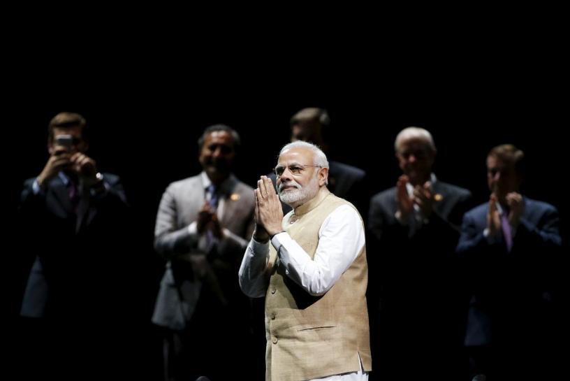 Indian Prime Minister Narendra Modi gestures on stage during a community reception at SAP Center in San Jose, California September 27, 2015. REUTERS/Stephen Lam