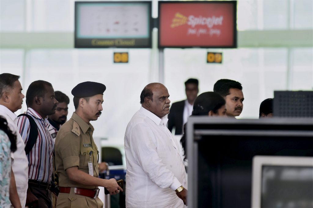 Chennai: Former Kolkata High Court Judgec Justice CS Karnan being taken by West Bengal police to that city at the airport in Chennai on Wednesday. He was arrested yesterday night from Coimbatore. PTI Photo by R Senthil Kumar (PTI6_21_2017_000134B)