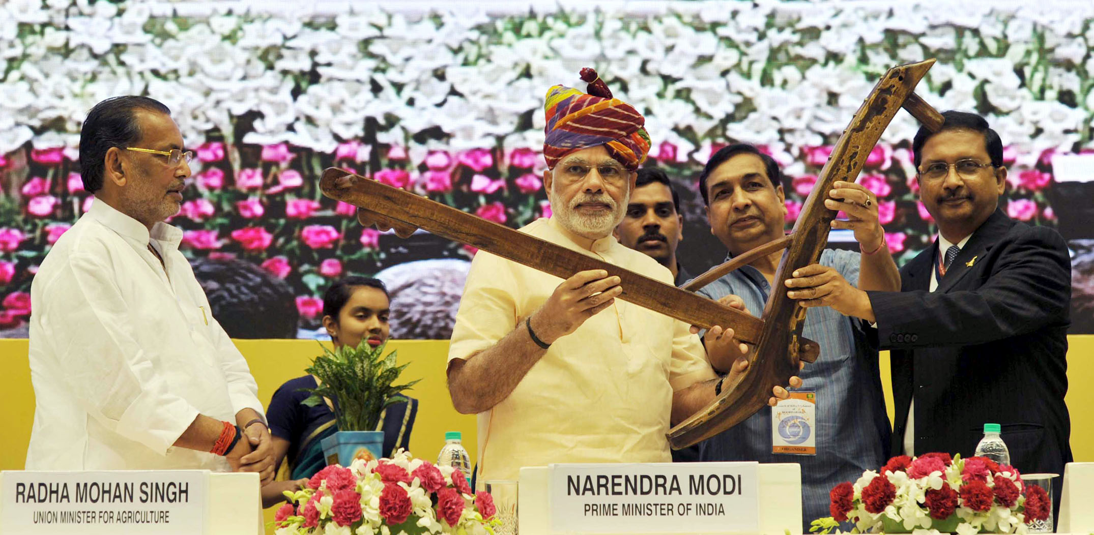 The Prime Minister, Shri Narendra Modi being presented a "Plough" as symbol of farming at the launching ceremony of DD Kisan Channel, in New Delhi on May 26, 2015. The Union Minister for Agriculture, Shri Radha Mohan Singh is also seen.
