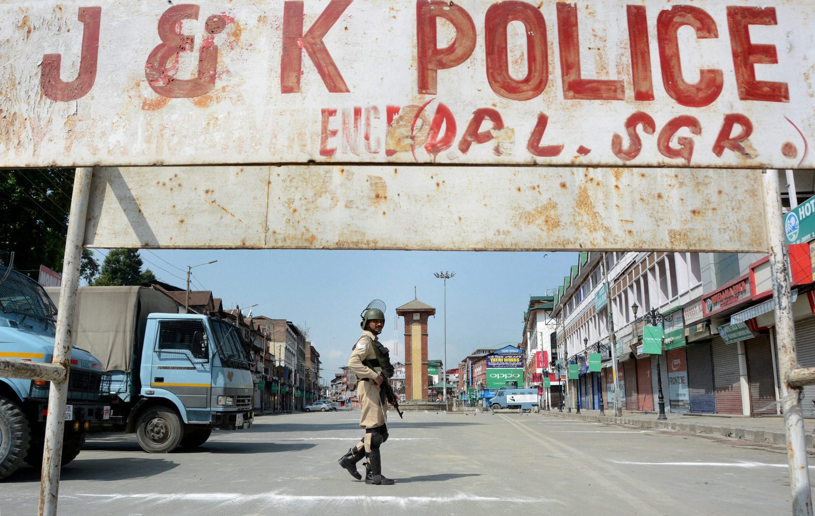 Srinagar: A security personnel guards near Lal Chowk during a strike called given by Hurriyat leaders on the 71st Independence Day, in Srinagar on Tuesday. PTI Photo (PTI8_15_2017_000102B)