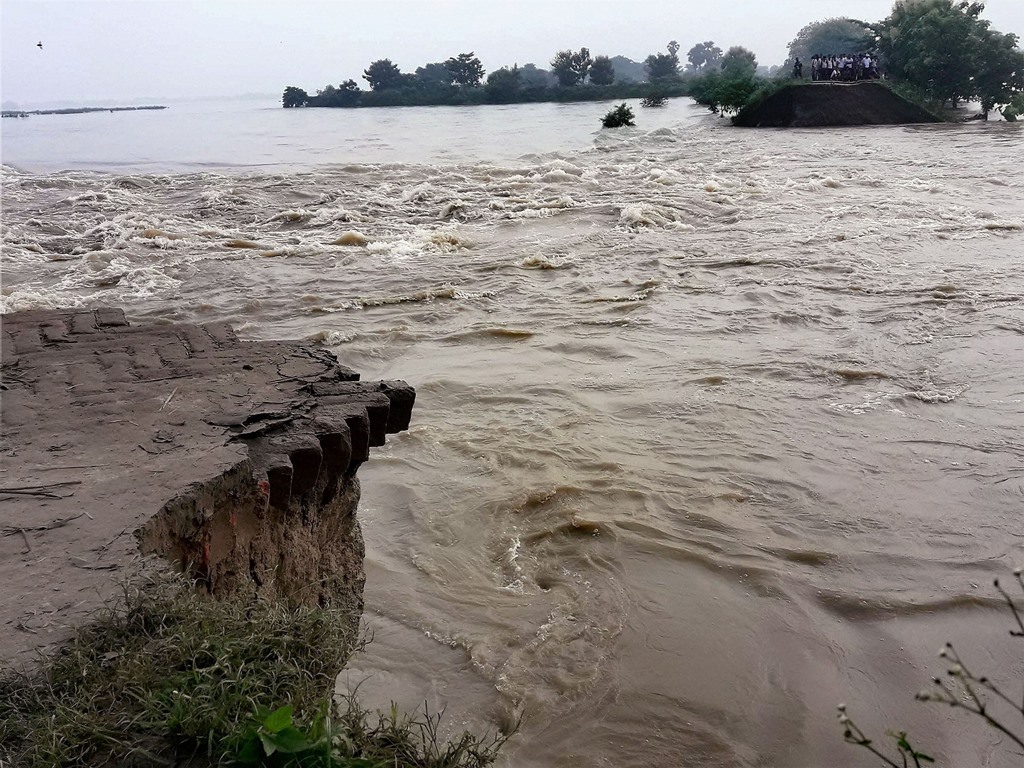 Gopalganj : A damage dam in flood affected Gopalganj on Wednesday. PTI Photo (PTI8 16 2017 000092B)
