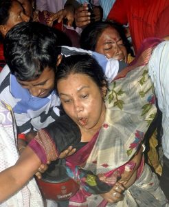 Agartala: Mother of slain journalist Santanu Bhowmik break down in tears at GBP hospital in Agartala on Wednesday. Santanu(23) who was a cameraman of a local cable TV channel, was brutally killed allegedly by IPFT supporters at Mandai in Jirania subdivision on Wednesday. PTI Photo (PTI9_20_2017_000177B) *** Local Caption ***