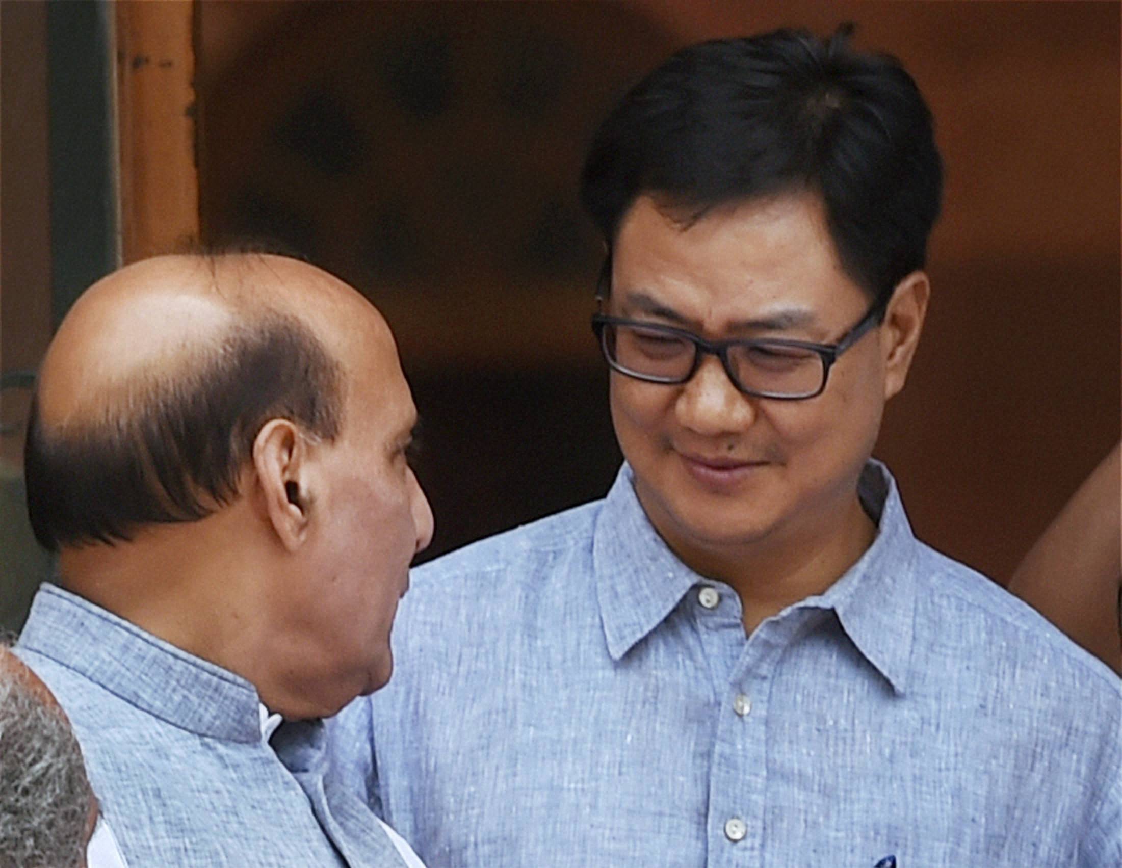 New Delhi : Home Minister Rajnath Singh with MoS Home Kiren Rijiju after a Cabinet meeting at South Block in New Delhi on Wednesday. PTI Photo by Subhav Shukla (PTI6_1_2016_000062A)