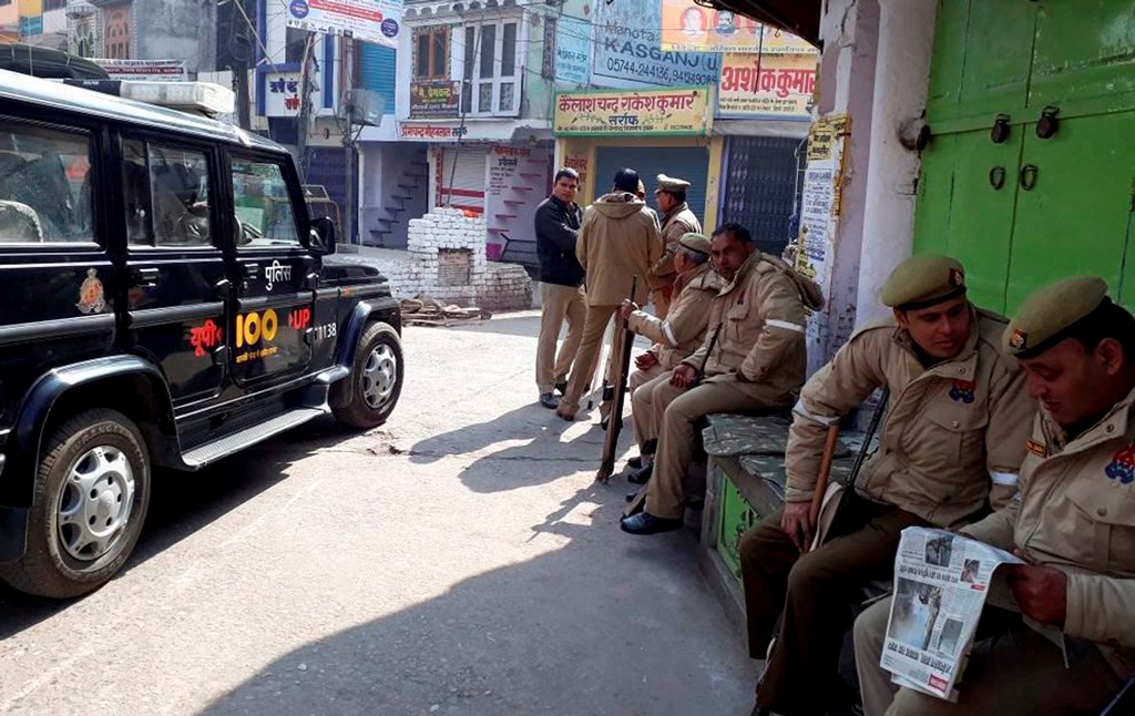 Kasganj (UP): More than 80 persons were arrested while Rapid Action Force (RAF) and Provincial Armed Constabulary (PAC) personnel intensified vigil in Kasganj on Sunday. PTI Photo (PTI1_28_2018_000205B)