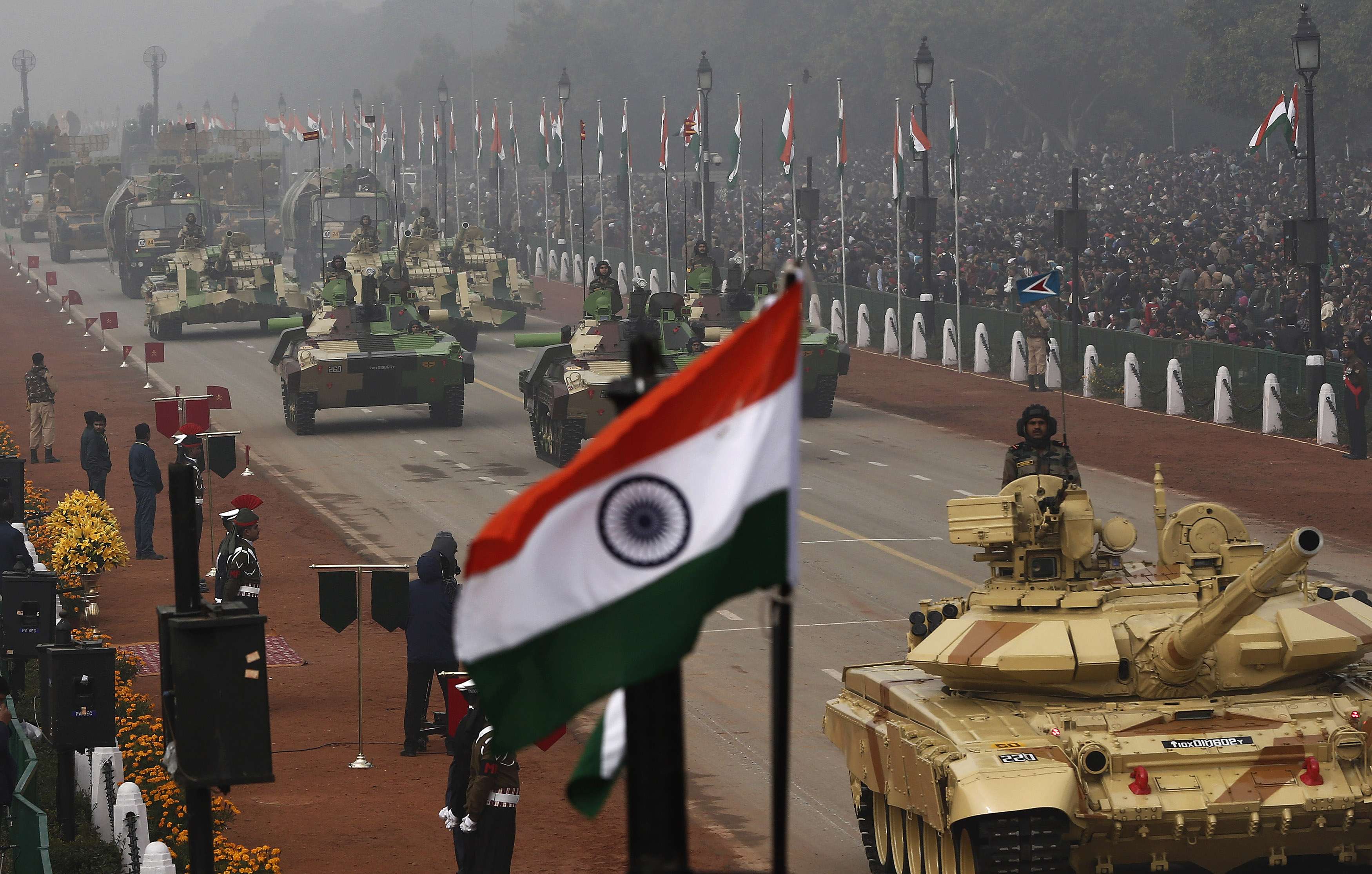 Indian Army's Arjun MK-I tanks (MBTs) are driven for display during the Republic Day parade in New Delhi January 26, 2014. India celebrated its 65th Republic Day on Sunday. REUTERS/Adnan Abidi (INDIA - Tags: MILITARY ANNIVERSARY POLITICS)