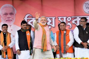 Sonamura: Prime Minister Narendra Modi waves at the public during an election campaign rally ahead of Tripura Assembly Election in Sonamura on Thursday. PTI Photo (PTI2_8_2018_000075B)