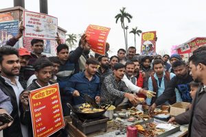 Lucknow: Youth claiming to be unemployed sell 'Pakoras' to counter Prime Minister Narendra Modi's statement on employment, in an old area of Lucknow on Wednesday. PTI Photo by Nand Kumar(PTI2_7_2018_000178B)