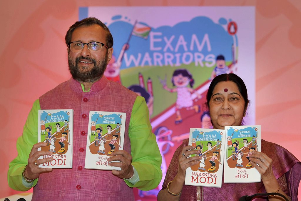 New Delhi: External Affairs Minister Sushma Swaraj with Union HRD Minister Prakash Javadekar releases Prime Ministrer Narendra Modi’s book "Exam Warriors" at a function in New Delhi on Saturday. PTI Photo by Shahabaz Khan (PTI2_3_2018_000119B)