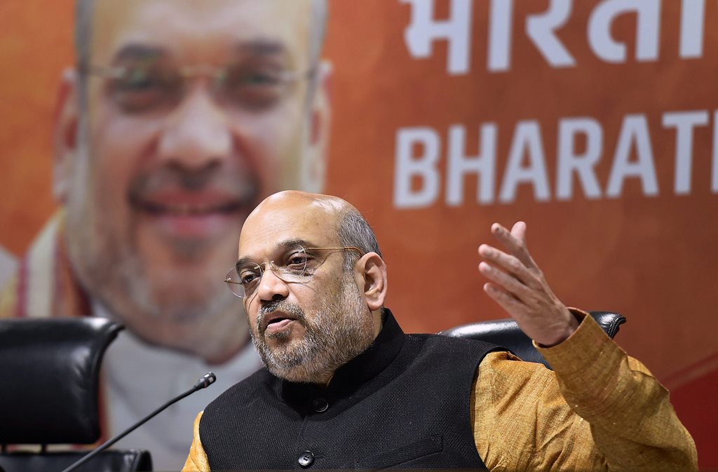 New Delhi: BJP President Amit Shah speaks during a press conference after their victory in North-East Assembly election at party headquarters in New Delhi on Saturday. PTI Photo by Kamal Singh (PTI3_3_2018_000146B)