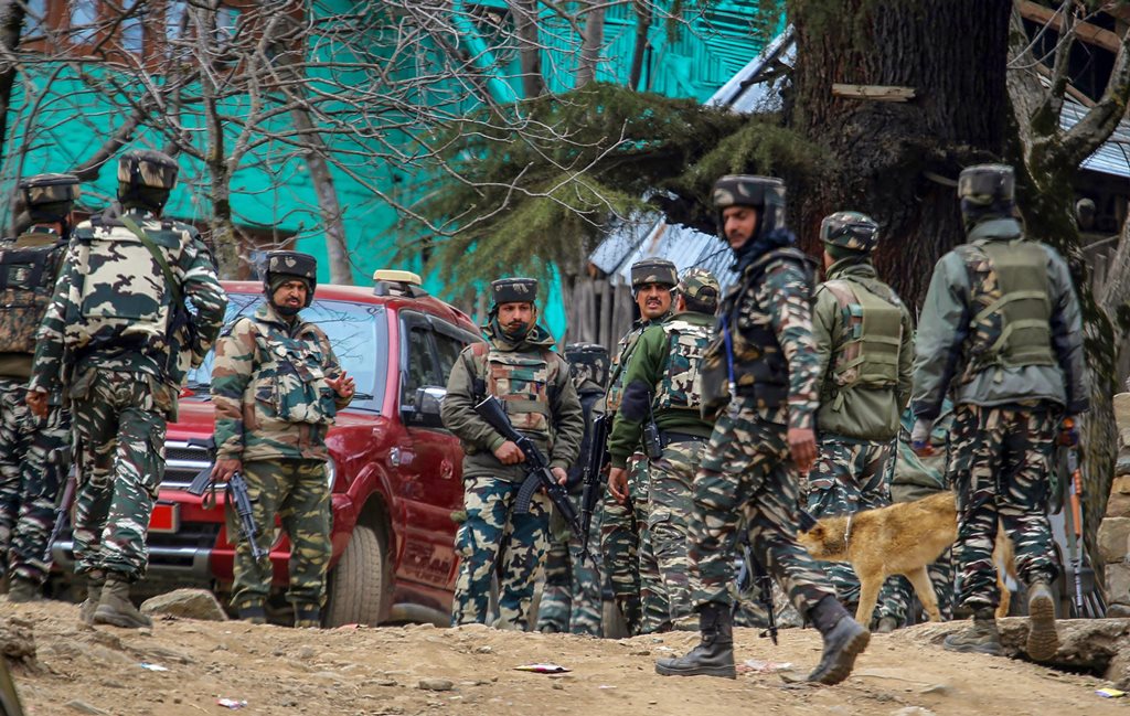Kupwara: Army personnel cordon off the spot where militants were hiding during an encounter in which four militants and four security personnel including two policemen and two army jawans were killed, at Halmatpora in Kupwara district of North Kashmir on Wednesday. PTI Photo (PTI3_21_2018_000161B)