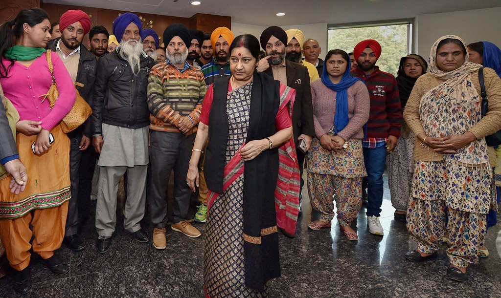 **FILE PHOTO** New Delhi: In this file photo dated 7 Feb, 2016, External Affairs Minister Sushma Swaraj meets with the family members of Indians stuck in Iraq, at Jawahar Lal Bhavan in New Delhi. External Affairs Minister Sushma Swaraj in a statement made at Rajya Sabha today, stated that the 39 bodies exhumed from a mount in Badoosh in Iraq have been identified as those of abducted Indians and will be brought back to India on a special plane. PTI Photo by Vijay Verma (PTI3_20_2018_000063B)
