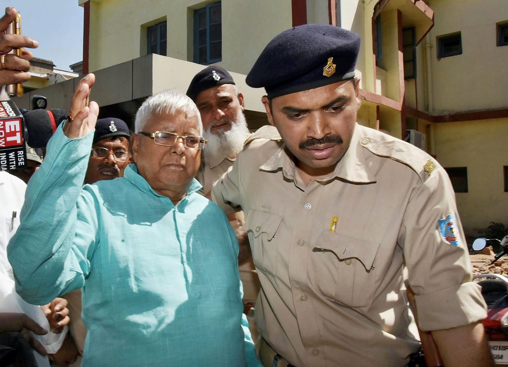 Ranchi: Former Bihar Chief Minister Lalu Prasad Yadav leaves special CBI court after being pronounced guilty in the fourth Dumka multi-crore fodder scam case, in Ranchi on Monday. PTI Photo (PTI3_19_2018_000049B)