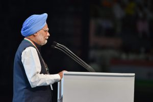 New Delhi: Former Prime Minister Manmohan Singh speaks during the second day of the 84th Plenary Session of Indian National Congress (INC), at the Indira Gandhi stadium in New Delhi on Sunday. PTI Photo by Vijay Verma (PTI3_18_2018_000081B)
