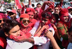 Allahabad: Samajwadi party workers celebrate their party success in Phulpur by-election, in Allahabad on Wednesday. PTI Photo(PTI3_14_2018_000073B)