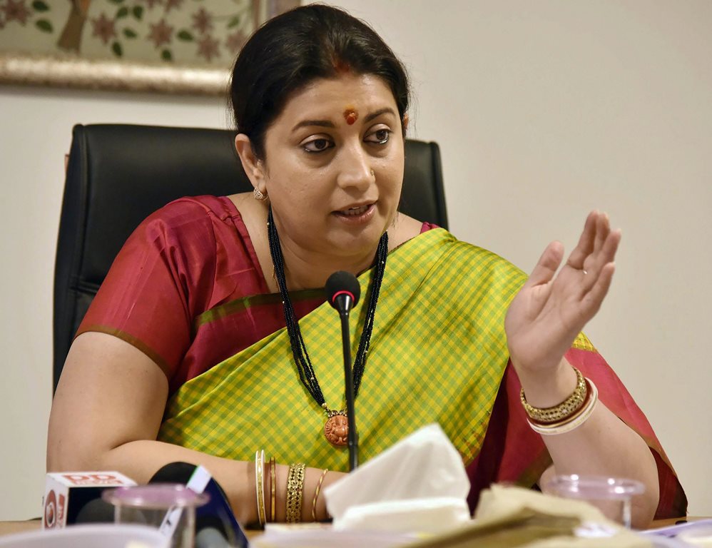 New Delhi: Union Minister for Textiles and Information & Broadcasting Smriti Irani interacting with the media regarding cabinet approval for Integrated Scheme for Development of Silk Industry, in New Delhi on Thursday. PTI Photo/PIB (PTI3_22_2018_000083B)