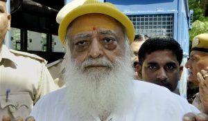 **FILE** New Delhi: File photo of Asaram Bapu being produced in Jodhpur court in connection with the sexual harassment case. A Jodhpur court on Wednesday convicted self-styled godman Asaram of raping a minor girl at his ashram in Rajasthan in 2013. PTI Photo PTI Photo(PTI4_25_2018_000033B)