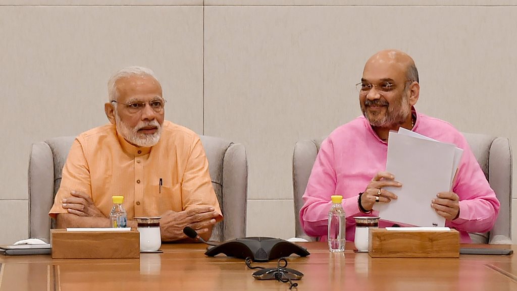 New Delhi: Prime Minister Narendra Modi and BJP President Amit Shah during BJP Election committee meeting at BJP Headquarters in New Delhi on Sunday. PTI Photo by Vijay Verma (PTI4_8_2018_000160B)