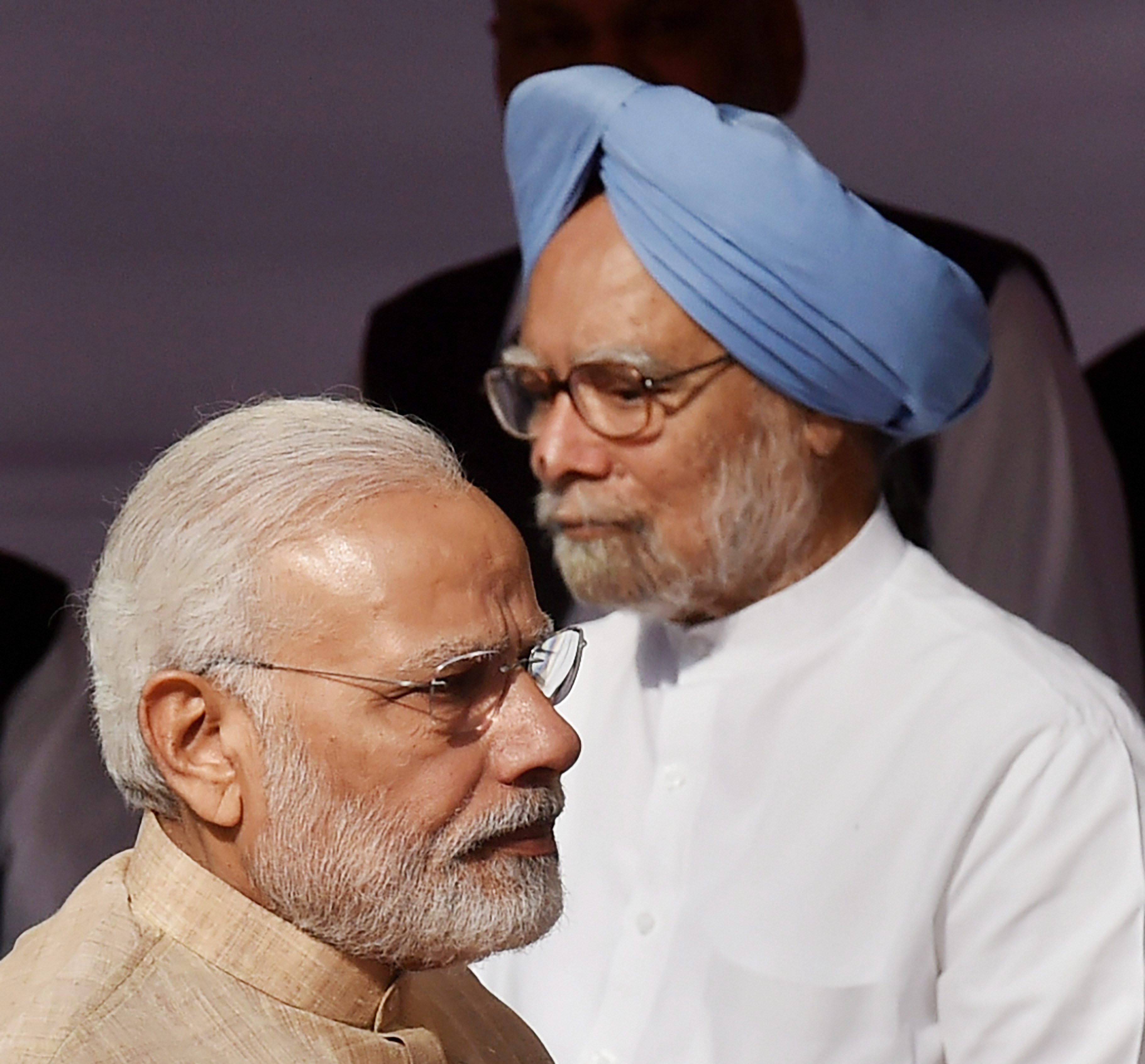 New Delhi: Prime Minister Narendra Modi and former prime minister Manmohan Singh after paying tributes to Babasaheb B R Ambedkar on the occasion of his 127th birth anniversary, at Parliament House in New Delhi on Saturday. PTI Photo by Atul Yadav (PTI4_14_2018_000022B)