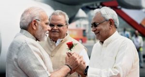 Patna: Prime Minister Narendra Modi being welcomed by Bihar Chief Minister Nitish Kumar and Bihar Governor Satyapal Malik upon his arrival at Jay Prakash Narayan International Airport in Patna on Tuesday. PTI Photo/PIB(PTI4_10_2018_000043B)