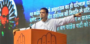 New Delhi: Congress President Rahul Gandhi addresses at the launch of the party's nationwide "Save the Constitution" campaign at Talkatora Stadium in New Delhi on Monday. PTI Photo by Vijay Verma (PTI4_23_2018_000058B)