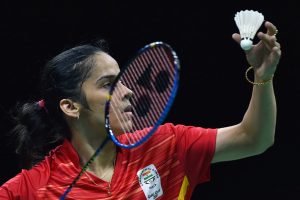 Gold Coast : India's Saina Nehwal returns a shot to Singapore's Jia Min Yeo during the women's singles of Badminton Mixed Team Semifinals match at the Commonwealth Games 2018 in Gold Coast, Australia on Sunday. PTI Photo by Manvender Vashist (PTI4_8_2018_000023B)