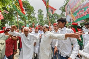Lucknow: Samajwadi Party (SP) workers celebrate their party success in Uttar Pradesh by-elections, outside their party office in Lucknow on Thursday, May 31, 2018. (PTI Photo/Nand kumar)(PTI5_31_2018_000089B)