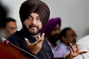 **FILE PHOTO** New Delhi: In this file photo dated Wednesday, May 02, 2018, Punjab Minister for Tourism & Cultural Affairs Navjot Singh Sidhu is seen at a press conference in Amritsar. The Supreme Court on Tuesday convicted Sidhu for voluntarily causing hurt to a 65-year-old man in a road rage incident in 1988, but spared him a jail term in the case. PTI Photo (PTI5_15_2018_000035B)
