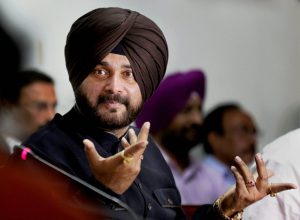 **FILE PHOTO** New Delhi: In this file photo dated Wednesday, May 02, 2018, Punjab Minister for Tourism & Cultural Affairs Navjot Singh Sidhu is seen at a press conference in Amritsar. The Supreme Court on Tuesday convicted Sidhu for voluntarily causing hurt to a 65-year-old man in a road rage incident in 1988, but spared him a jail term in the case. PTI Photo (PTI5_15_2018_000035B)