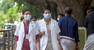 Kozhikode: Doctors wear safety masks as a precaution after the outbreak of 'Nipah' virus, at a hospital in Kozhikode, on Monday. (PTI Photo)(PTI5_21_2018_000161B)