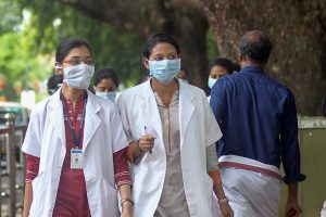 Kozhikode: Doctors wear safety masks as a precaution after the outbreak of 'Nipah' virus, at a hospital in Kozhikode, on Monday. (PTI Photo)(PTI5_21_2018_000161B)
