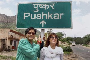**FILE PHOTO** New Delhi: File photo dated August 08, 2010 shows Congress MP Shashi Tharoor with Sunanda Pushkar posing for a photograph against a signboard during their Ajmer visit. The Delhi Police on Monday filed a charge sheet in the death of Sunanda Pushkar, in which Tharoor has been named as an accused in the case. PTI Photo (PTI5_14_2018_000090B)