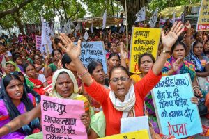 Patna: All India Progressive Women's Association (AIPWA) activists raise slogans as they protest against atrocities on women, in Patna on Friday, June 22, 2018. (PTI Photo) (PTI6_22_2018_000026B)