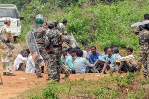 Khunti: Security personnel detain villagers while carrying out a search operation at the remote village Ghagra, where Member of Parliament (MP) Karia Munda's three bodyguards, belonging to Jharkhand Police, were allegedly kidnapped by Pathalgarhi supporters, in Khunti district on Wednesday, June 27, 2018. (PTI Photo) (PTI6_27_2018_000171B)