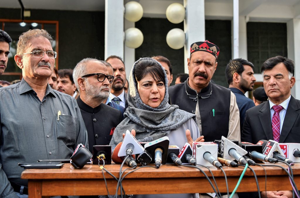 **FILE PHOTO** Srinagar: In this file photo dated May 09, 2018, Jammu and Kashmir Chief Minister Mehbooba Mufti addresses the media as Deputy Chief Minister Kavinder Gupta (L) looks on after an all-party meeting at SKICC in Srinagar. BJP on Tuesday, June 19, 2018, has pulled out of the PDP-BJP alliance government in Jammu and Kashmir. (PTI Photo/S Irfan)(PTI6_19_2018_000081B)