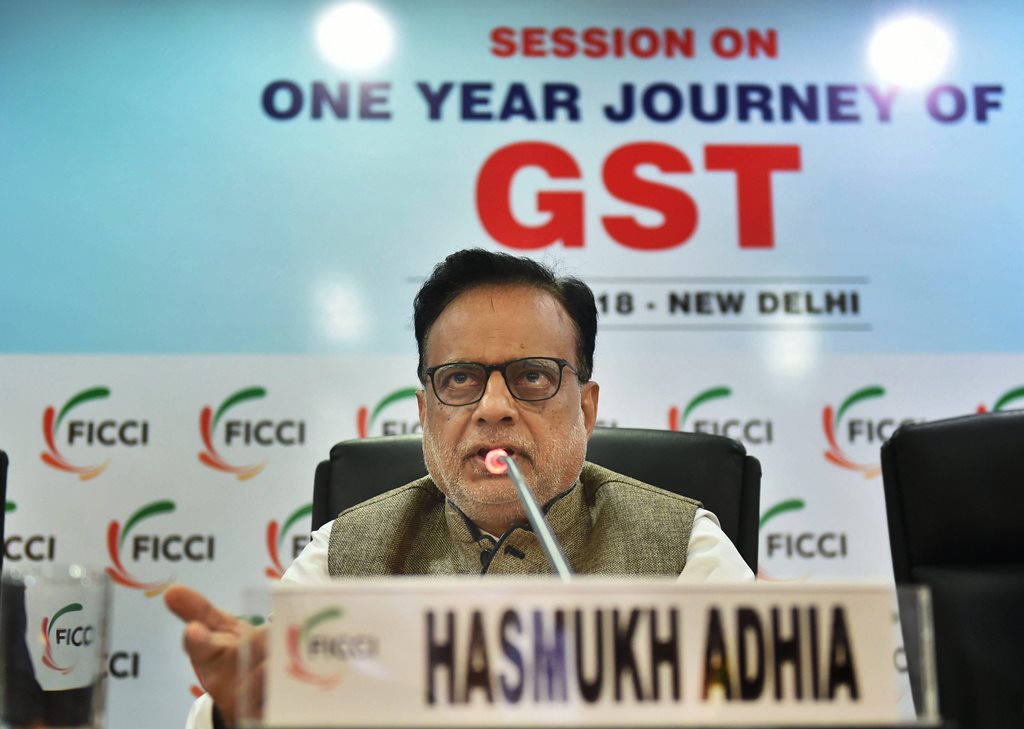 New Delhi: Revenue Secretary Hasmukh Adhia addresses during a session on 'One Year Journey Of GST' at FICCI office, in New Delhi, on Friday, July 06, 2018. (PTI Photo/Arun Sharma)(PTI7_6_2018_000027B)