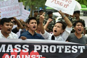 New Delhi: Manipur University Student's Union (MUSU) raise slogans demanding the removal of Vice Chancellor Adya Prasad Pandey, in New Delhi on Wednesday, July 18, 2018. (PTI Photo/Arun Sharma) (PTI7_18_2018_000150B)