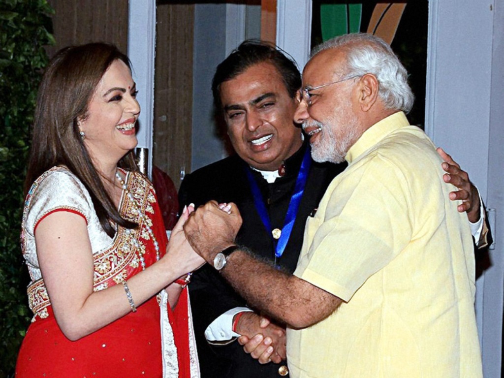 PM Narendra Modi is welcomed by Reliance Industries' Nita Ambani and Mukesh Ambani on his arrival for the re-dedication and inauguration of HN Reliance Foundation Hospital in Mumbai. PTI