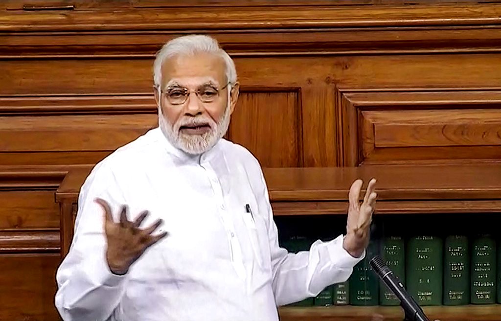 New Delhi: Prime Minister Narendra Modi speaks in the Lok Sabha on 'no-confidence motion' during the Monsoon Session of Parliament, in New Delhi on Friday, July 20, 2018. (LSTV GRAB via PTI)(PTI7_20_2018_000270B)